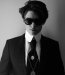 Baptiste Giabiconi véritable it boy et protégé de Karl Lagerfeld en chemise veste de costume et cravate