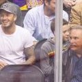 Le couple Beckham en famille à un match de Hockey