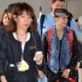 Justin Bieber et Selena Gomez, à l'aéroport de Narita (Tokyo)