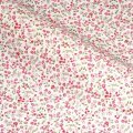 Motif liberty de fleurs roses sur fond blanc