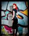 Corset à pois et chaussures rouges sur fond Graffiti.  