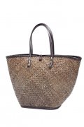 Panier en paille tressée marron et pourtour noir