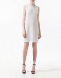 Robe à encolure et dos cloutés 