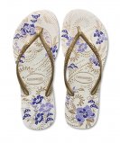 Tongs fleuris blanc cassé