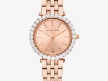 Montre féminine Michael Kors ton or rose avec lunette pavée