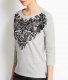Un pull-sweat à imprimé... Baroque
